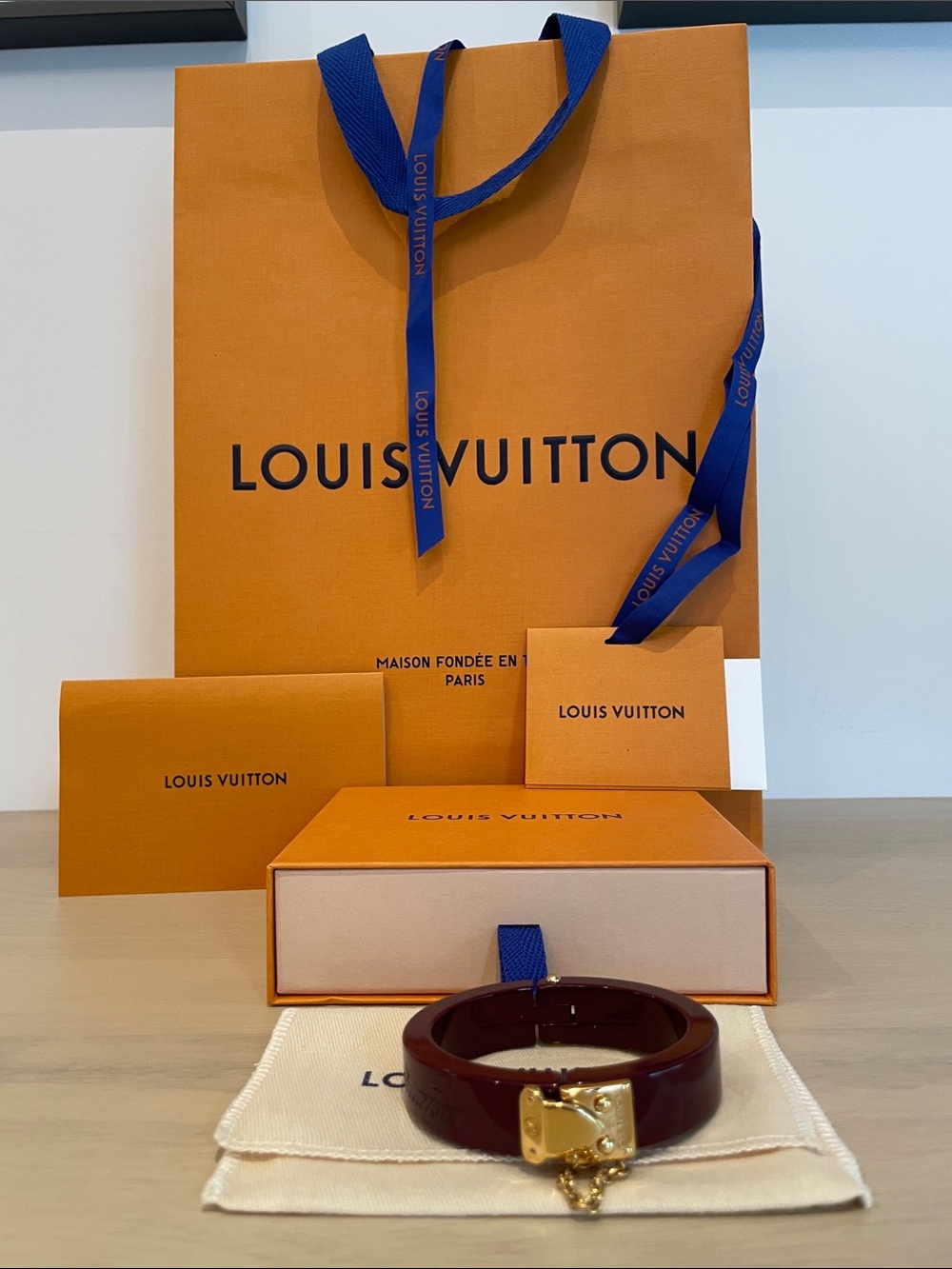 Louis Vuitton Burgundy Lock Me Bracelet with Plated Gold Lock